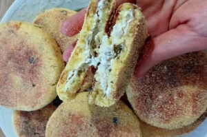 Moroccan stuffed Harcha with cheese and olives, golden and crispy on the outside with a creamy filling.